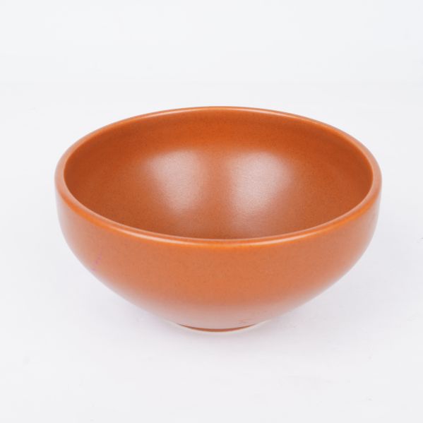 Orange skål i närbild, slät yta