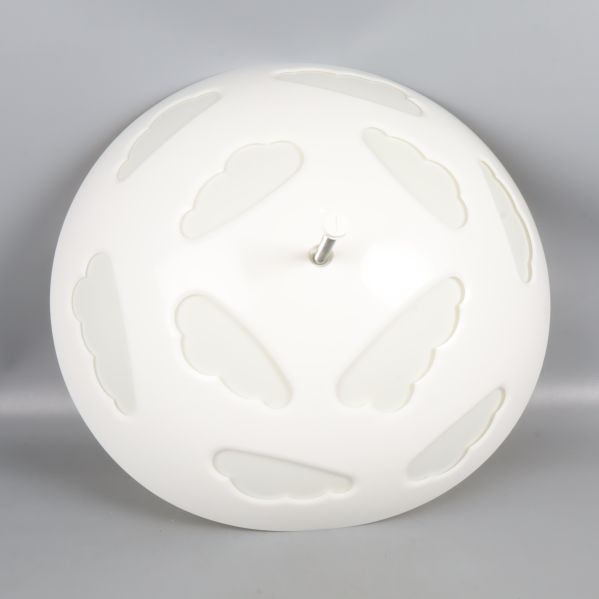 Lampa sedd ovanifrån med molnmönster