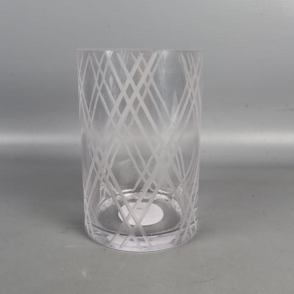 Transparent glasvas med abstrakt mönster