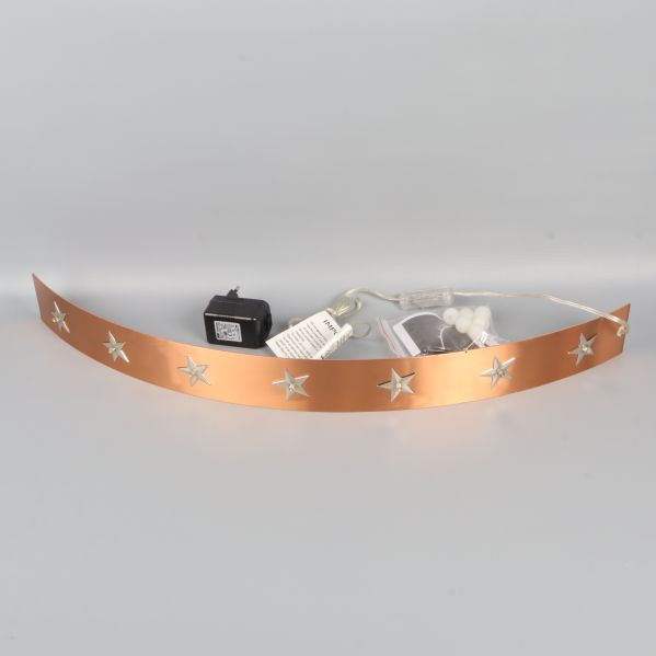 Ljusbåge i glänsande metall med strömsladd och tillbehör