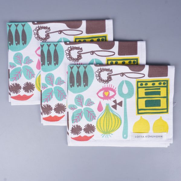 Tre hopvikta bordstabletter med färgglatt köksmönster