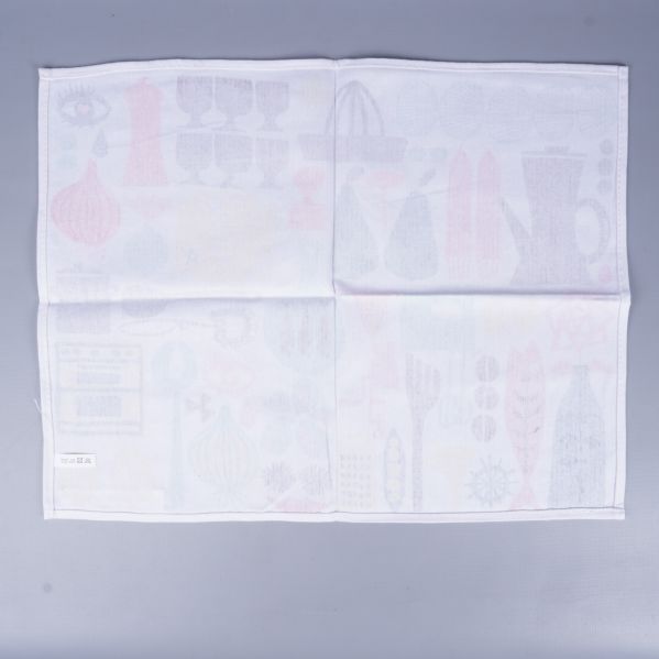 Baksidan av bordstablett i vitt tyg