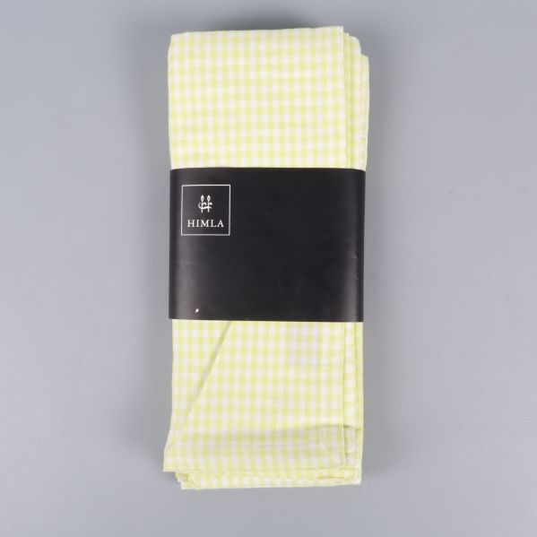 Ihopvikt ljusgrön och vit rutig servett med svart band