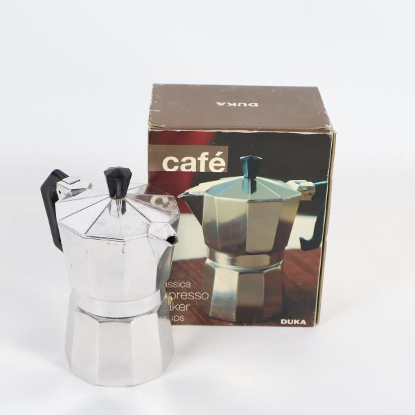 Espressobryggare med originalkartong visas framifrån