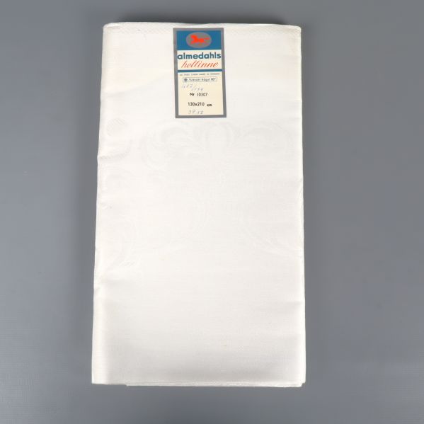 Vikt ljus hellinneduk med etikett upptill