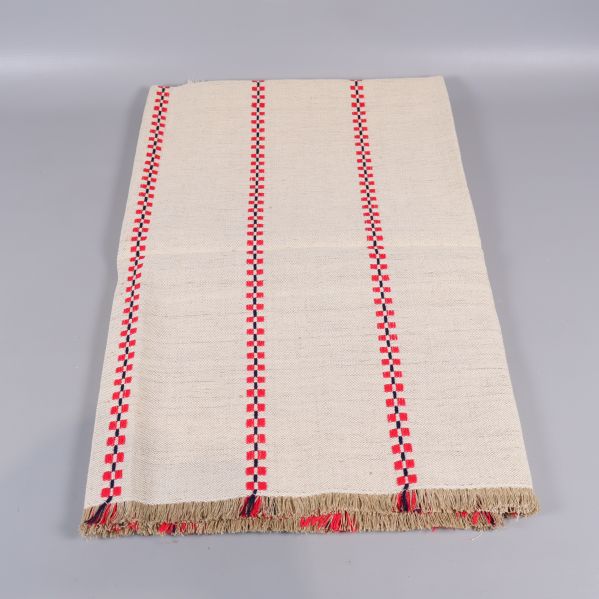 Duk hopvikt med röda och blå ränder samt franskant