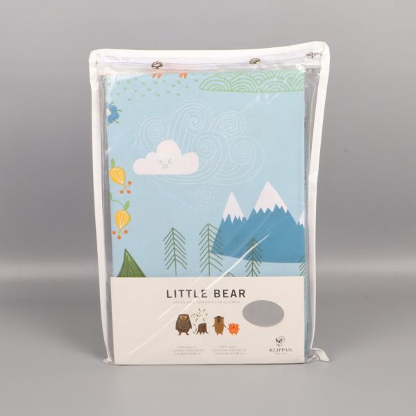 Framsida påslakansförpackning med djur och natur