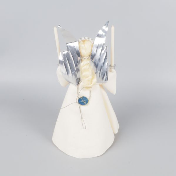 Baksidan på ängelspeldosa