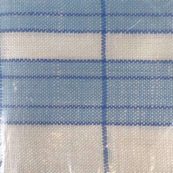 Närbild på tygstruktur och rutmönster
