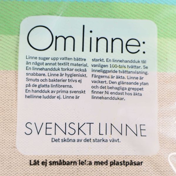 Etikett på linne handduk