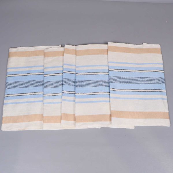 Fyra randiga kökshanddukar bredvid varandra