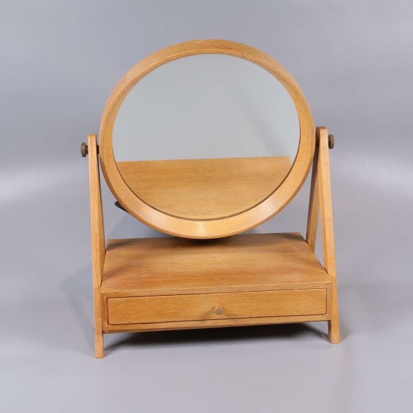 Spegelskåp i ljust trä med rund spegel