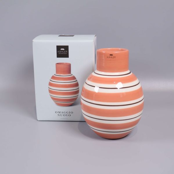 Randig aprikos och vit vas med originalkartong