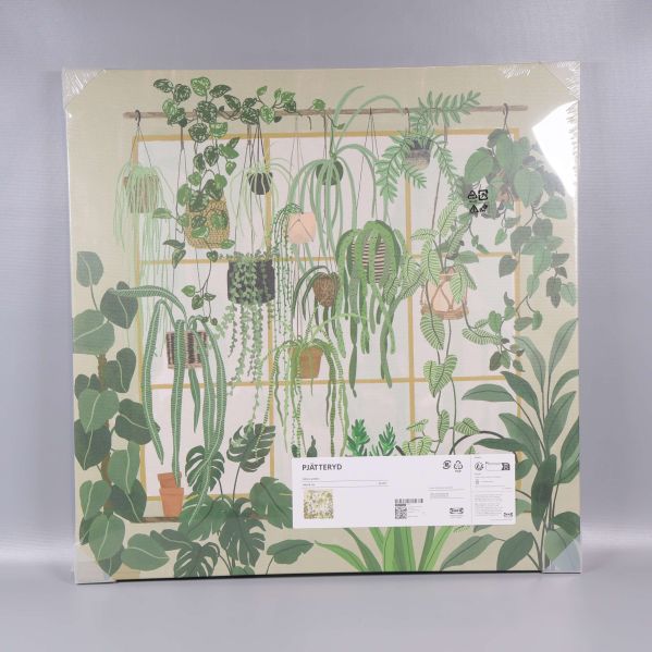 Fyrkantig tavla med gröna växter mot ljus bakgrund