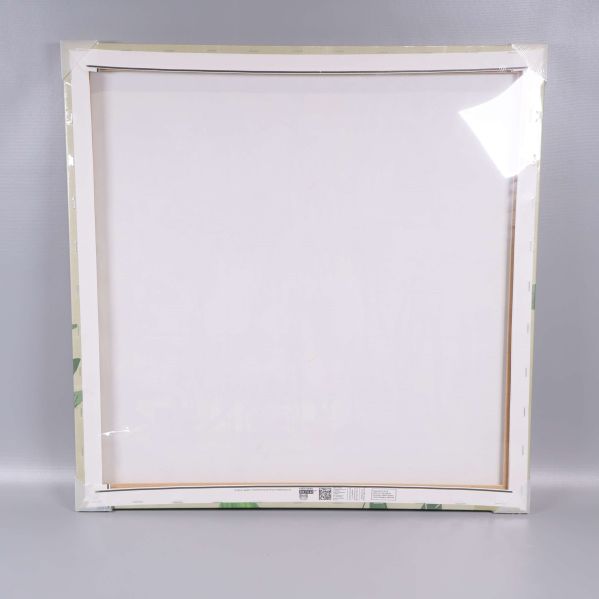 Tavlans baksida visar ramkonstruktion och canvas