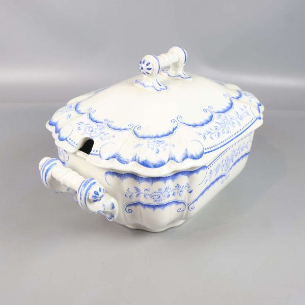 Såskål i vinkel som visar både lock och handtag