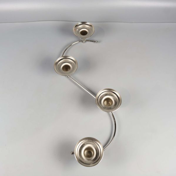 S-formad ljushållare fotad ovanifrån