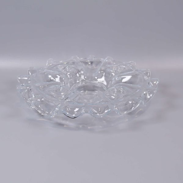 Rund ljusstake i klarglas med strukturerat mönster