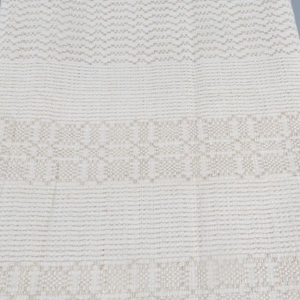 Närbild av löparens ljusa, vävda mönster