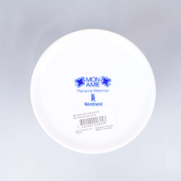 Botten med Mon Amie-stämpel och streckkodsetikett