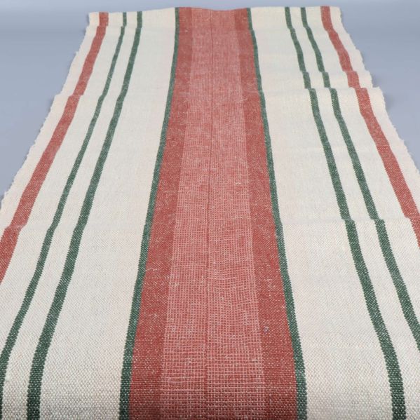 Långsmal löpare med ränder i hela sin längd