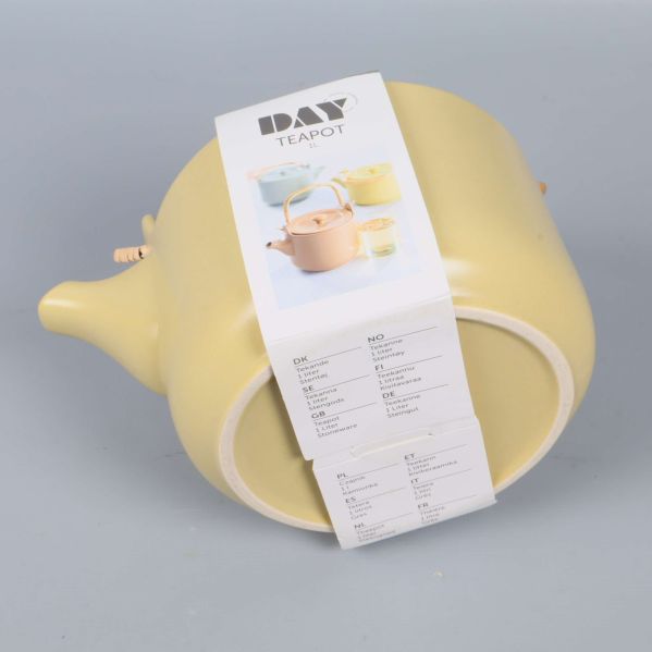 Tekannan visad underifrån med produktmärkning