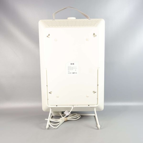 Baksidan av luftrenaren med etikett och ventilationshål