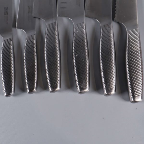 Handtag på rostfria köksknivar med greppmönster