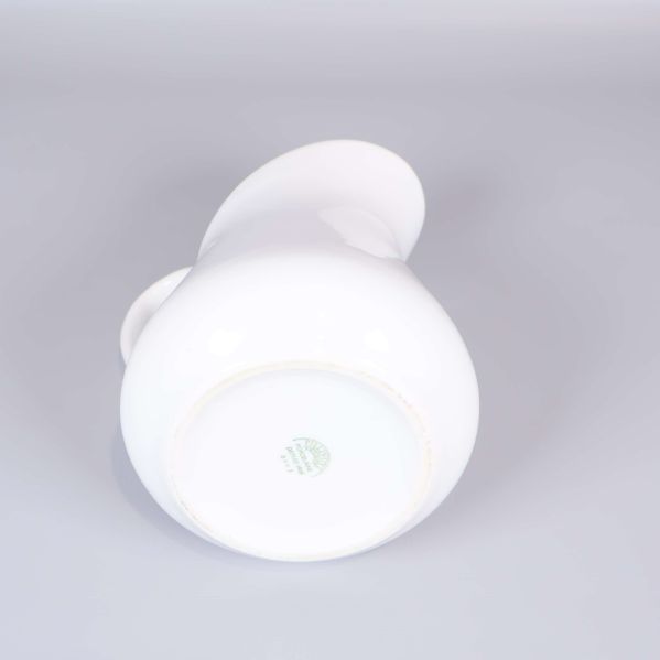 Kannans botten med stämpel från tillverkaren