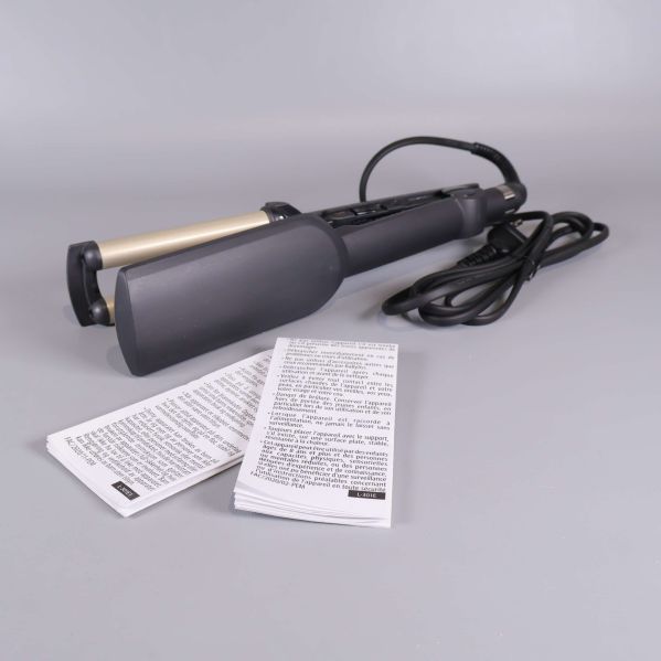 Vågstyler visas bakifrån tillsammans med instruktioner