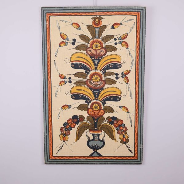 Brodyrbonad med färgstarka blommor och blad i ram