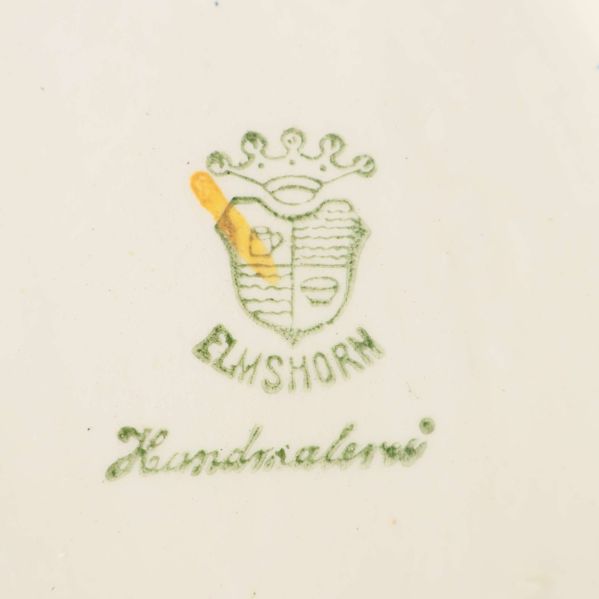 Närbild på Elmshorn-stämpel och texten handmåleri undertekannan