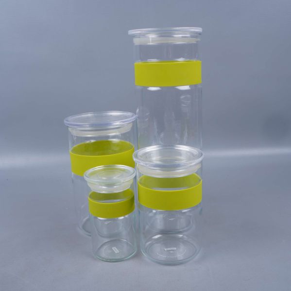 Glasburkar med lock och gula band framifrån
