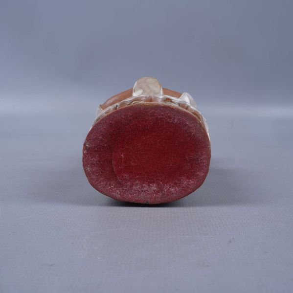 Undersidan av ängeln med röd botten