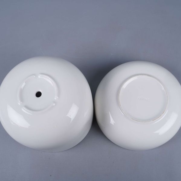 Tvådelad kruka och fat vända upp och ner