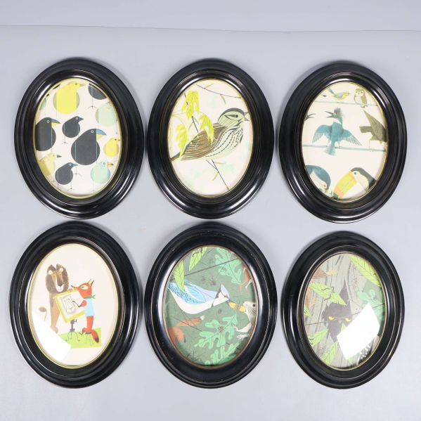 Sex ovala svarta ramar med djur och fågelmotiv