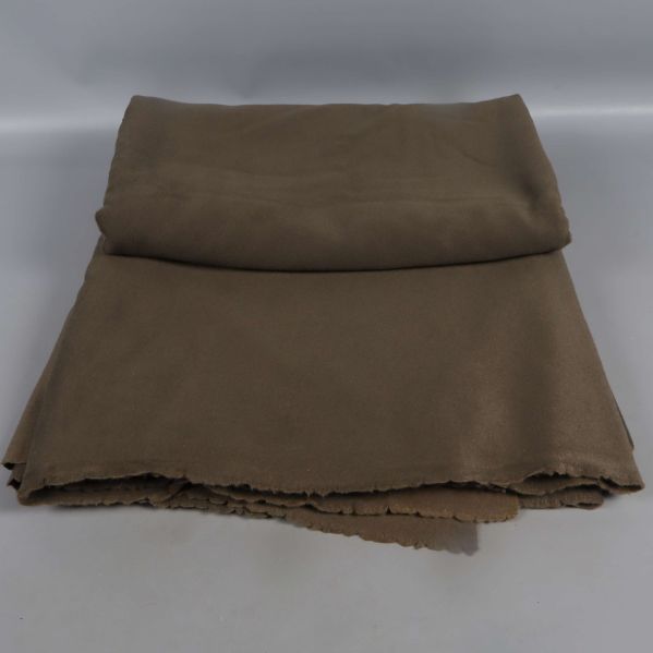 Tygstycke med råa kanter vikt