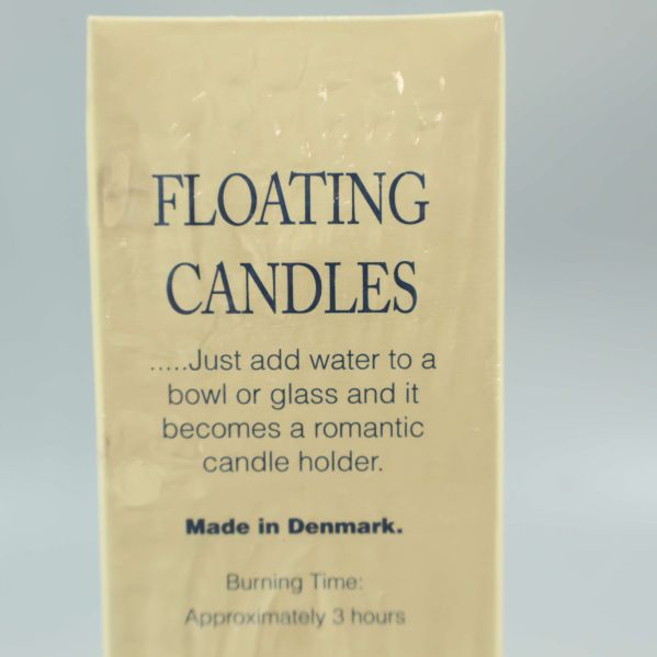 Förpackningssida med text floating candles made in Denmark