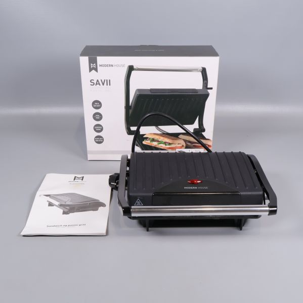 Paninigrill med sladd och låda samt manual