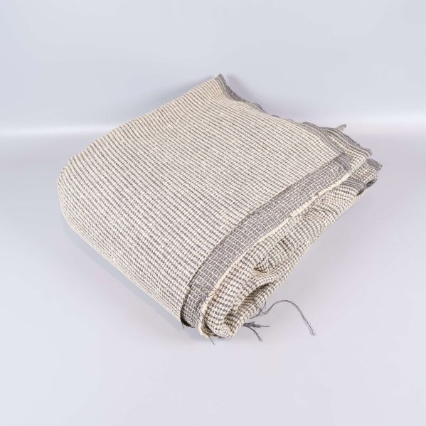 Vikt pläd i grått och beige med struktur