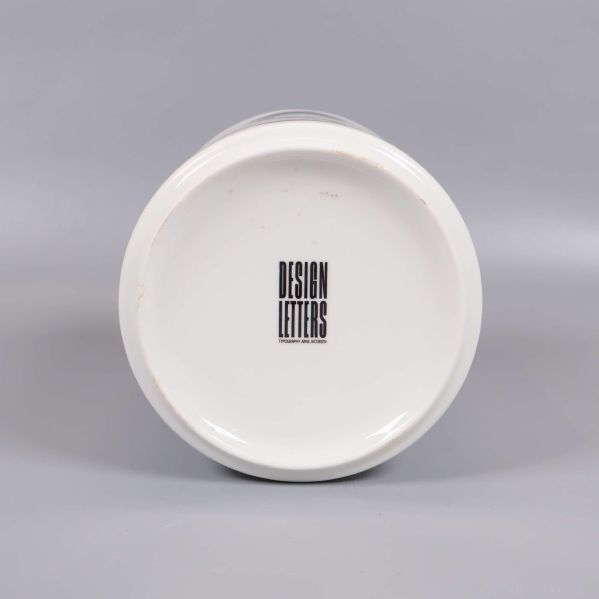 Burkens botten med Design Letters-logo