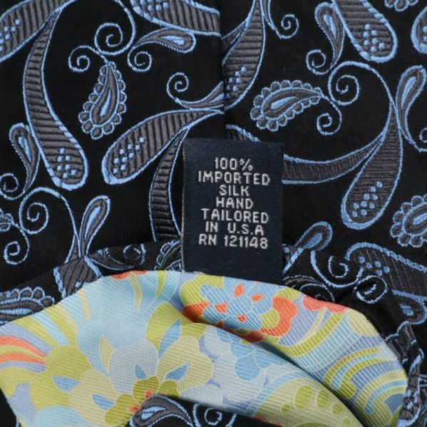 100% sidenmaterial Etikett visar material av 100% siden