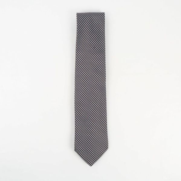 Mönstrad slips av siden Grafiskt mönstrad slips i ljusblått och brunt