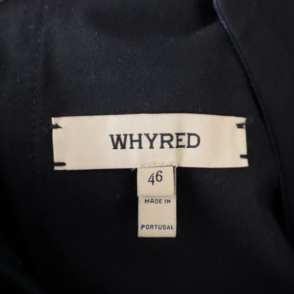 Närbild av varumärket Whyred och storleksetikett
