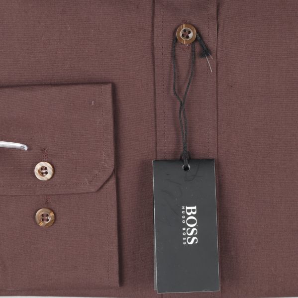 Knappar på skjortan Närbild av knappar på skjortan