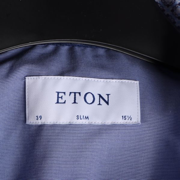 Märkesetikett för Eton med storleksinformation