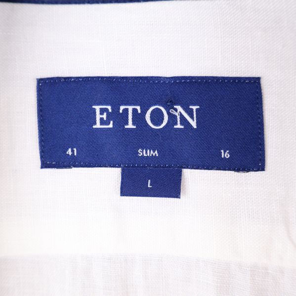 Närbild på Eton etikett och storlek