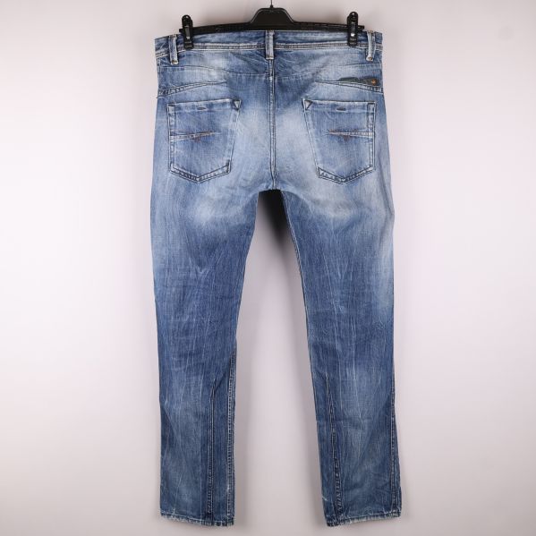Baksida av blå jeans