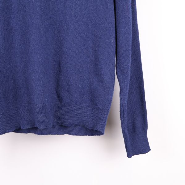 Närbild på tröjans nederkant