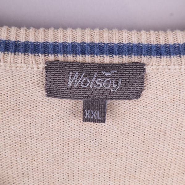 Närbild av etikett med Wolsey och XXL